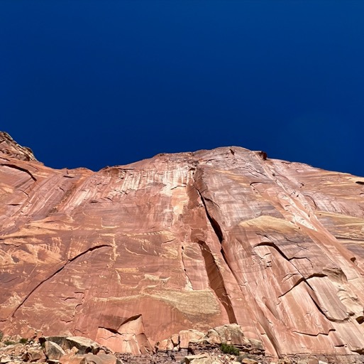 Sheer cliffs.. so pretty with the dark blue sky/
		    