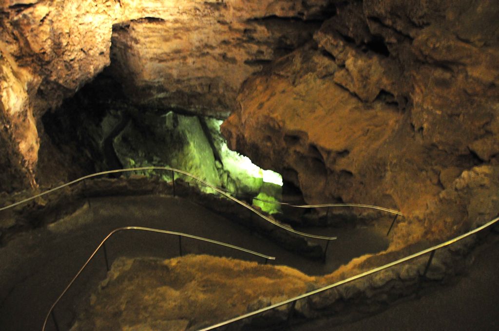Looking down into the cave/