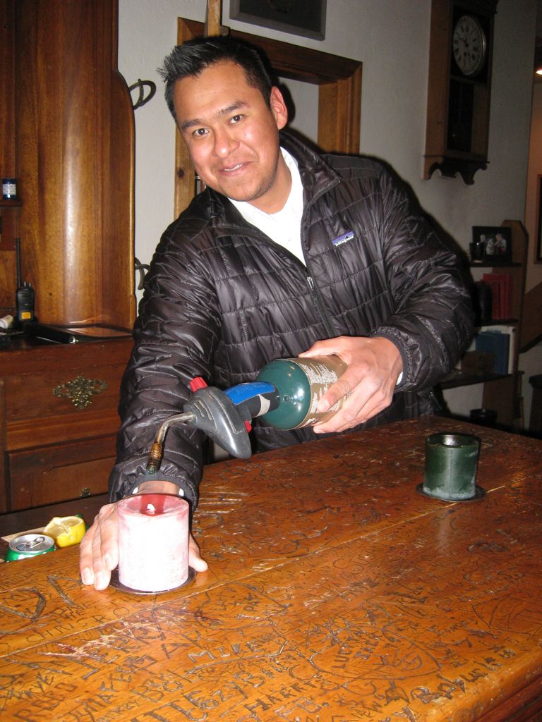 Eric blow-torching the candles/
