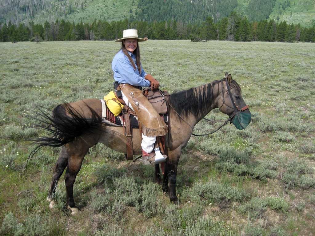 Grumpy wrangler gal who eventually warmed up/