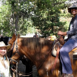 Cinda, a rodeo queen, and one of our wranglers/
		    