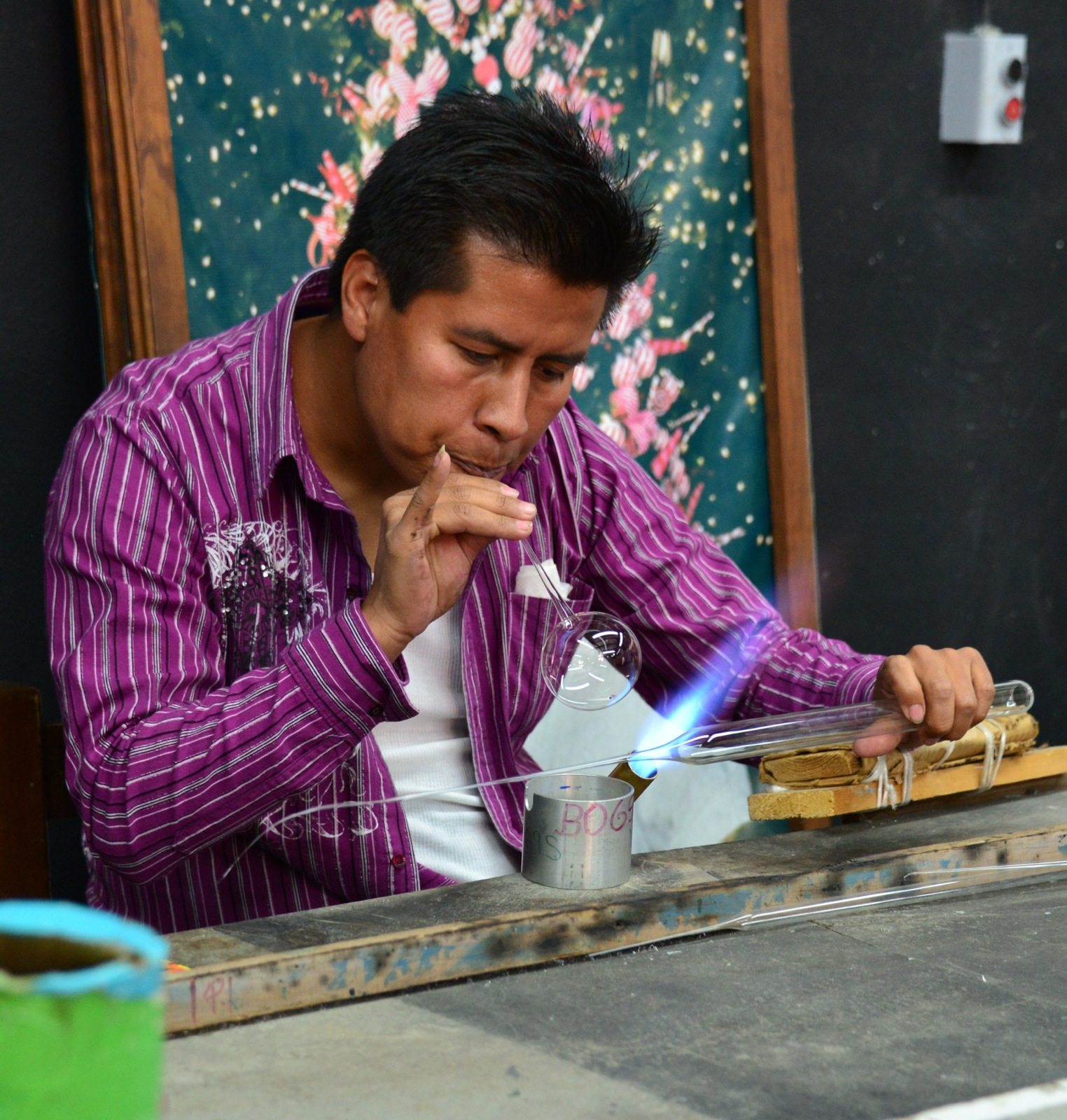 Dude making xmas ornaments/