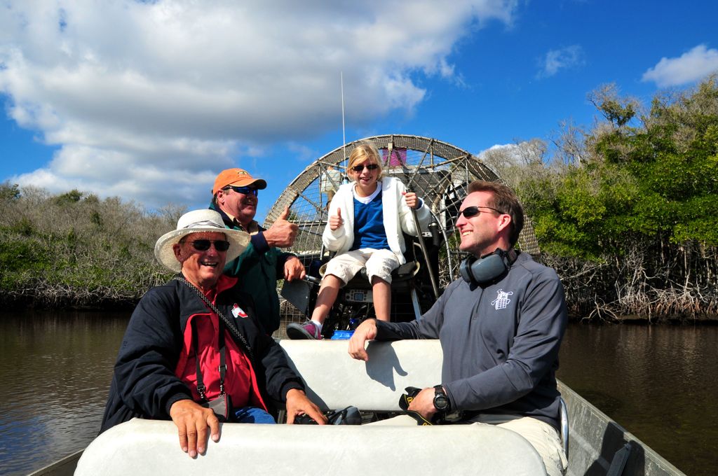 Lohren driving the airboat/