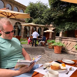 Planning out the day while having breakfast in the beautiful courtyard/
		    