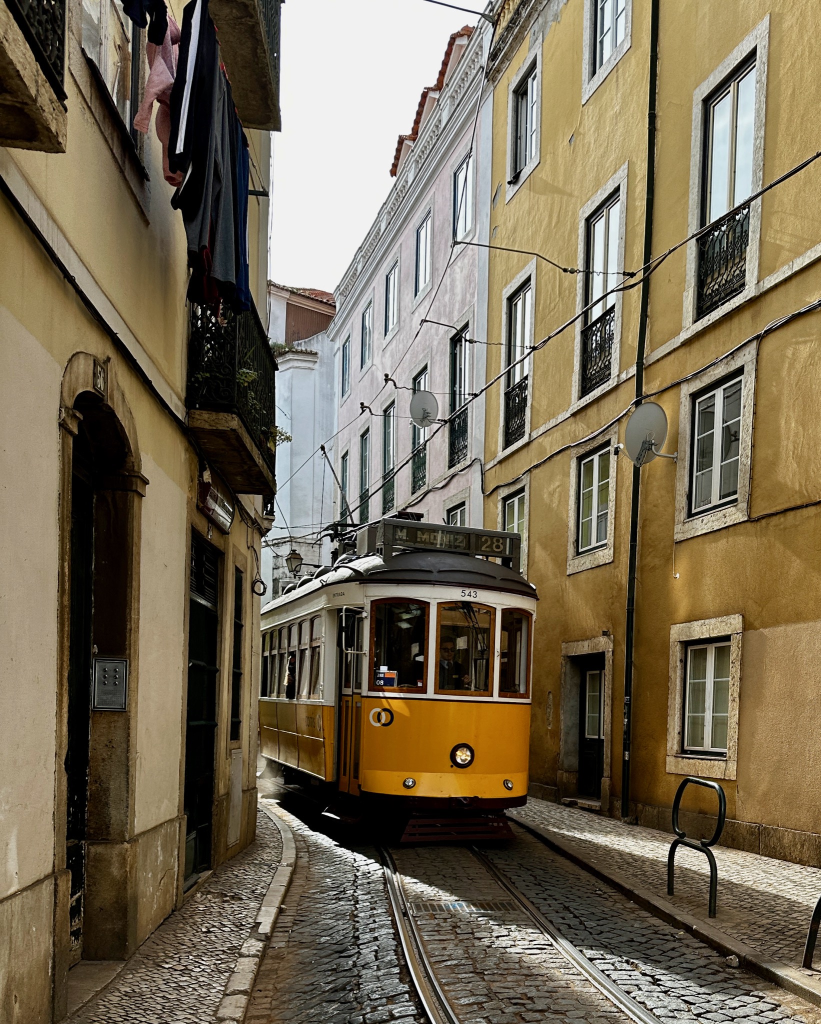 More adorable tram on Route 28/Calçada de São Vicente 72, 1100-214 Lisboa, Portugal