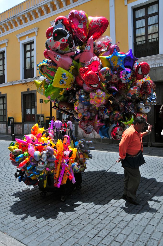 Assana was mesmerized by the balloon sellers/