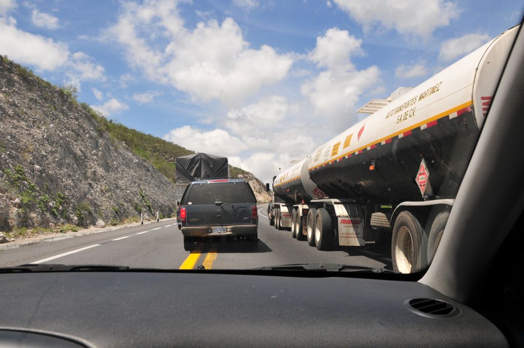 Very creative passing: one 18-wheeler passing the other, and we all follow!/