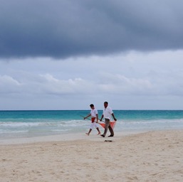 The beach crew raking the beach... again!/
		    