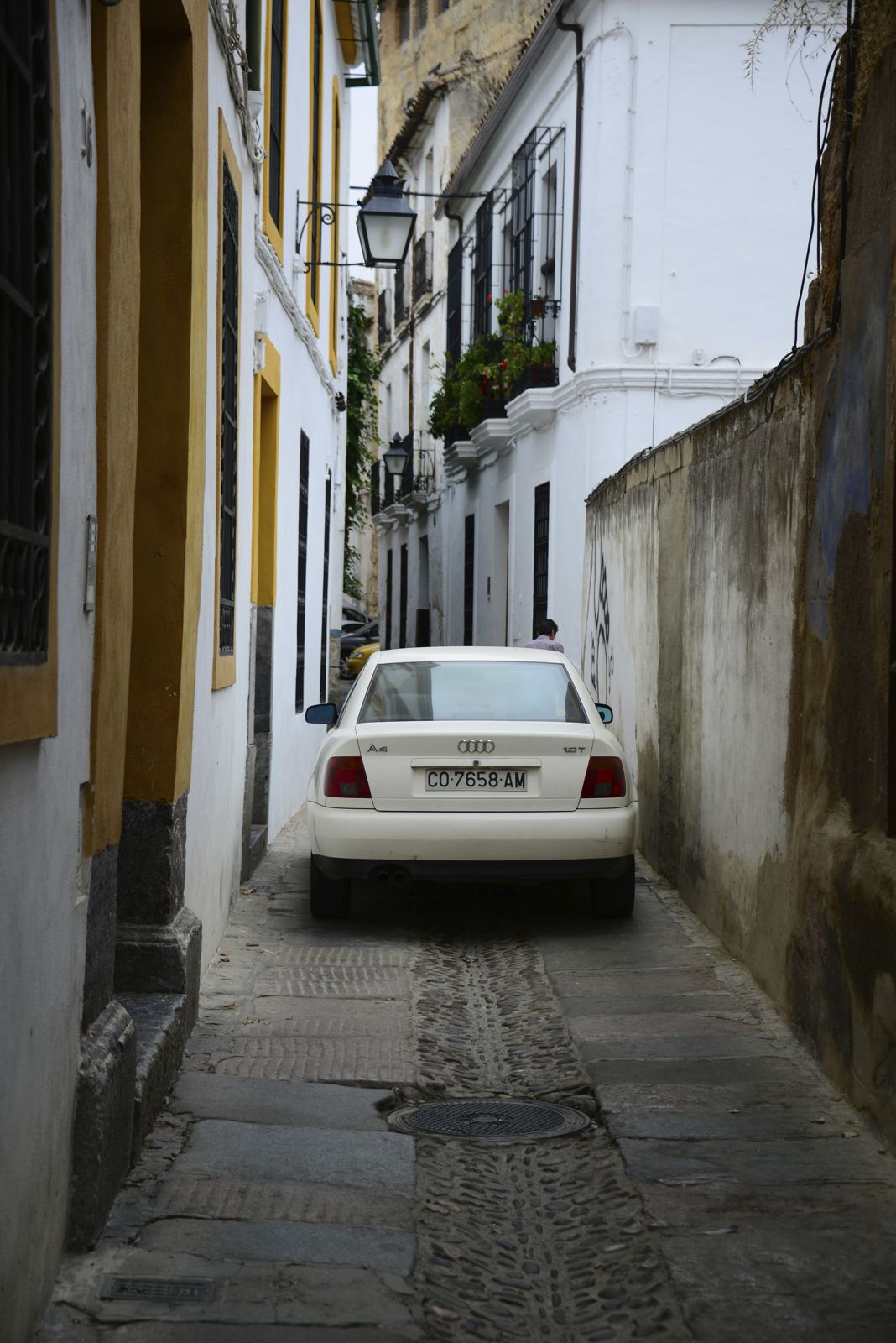 Yup, this car was actually squeezing itself thru this road/