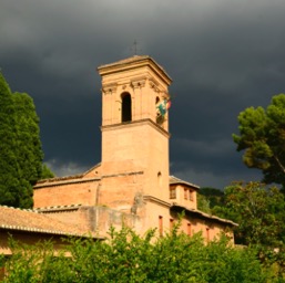 Parador de Grenada against the stormy sky/
		    
