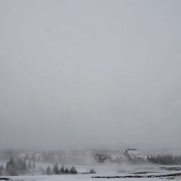 Old Faithful Inn from afar/
		    